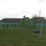 Willow Road children's park with soil heap.